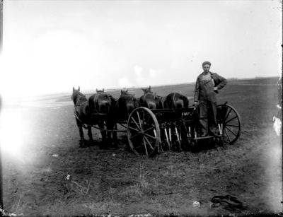Rud, Theodore seeding grain
