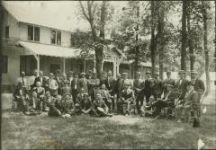 Outdoors group photo in front of house