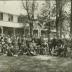 Outdoors group photo in front of house