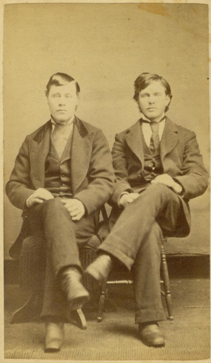Two unidentified men in a studio