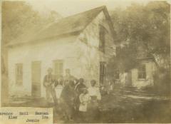 Klas Quist family in front of their home