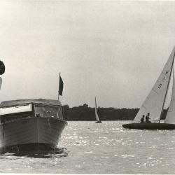 Sailboat race on White Bear Lake showing the Judge's boat and sailboats