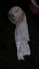 Wedding dress and veil donated by Carolyn Anderson.