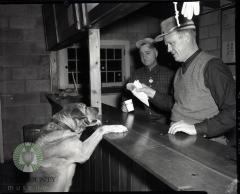 Lions Club Glenwood, Minnesota serving customers, Wally Ogdahl, Harold Brundin 