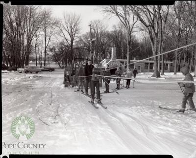Line of Young Skiers wait for the tow at Glenhaven Hills Grounds, Glenwood Minnesota