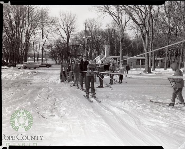 Line of Young Skiers wait for the tow at Glenhaven Hills Grounds, Glenwood Minnesota