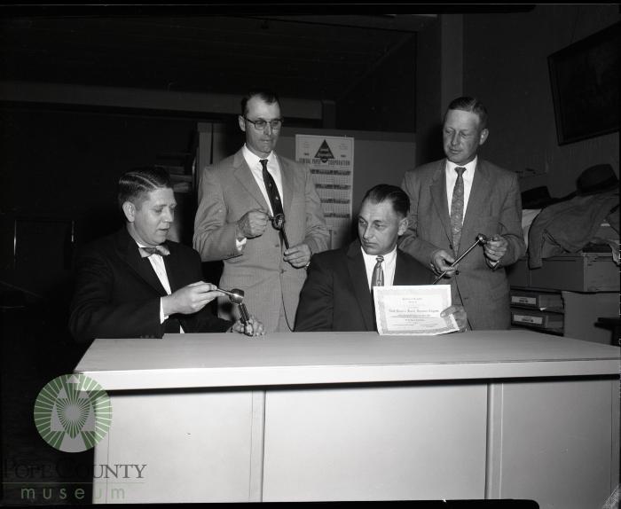 Pictured are: Clayton Thompson, A. Milten Johnson, Les Meyer, and Norris Barsness.