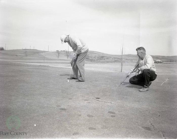 Warming Up Their Golf Clubs, Gilman Gandrud And Al Fjoslien, Long Beach, Minnesota 