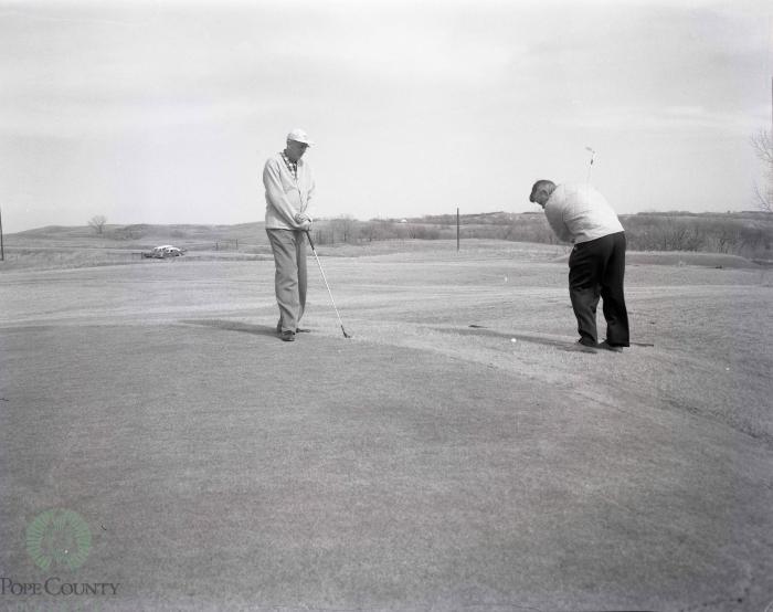Warming Up Their Golf Clubs, Gilman Gandrud And Al Fjoslien, Long Beach, Minnesota 