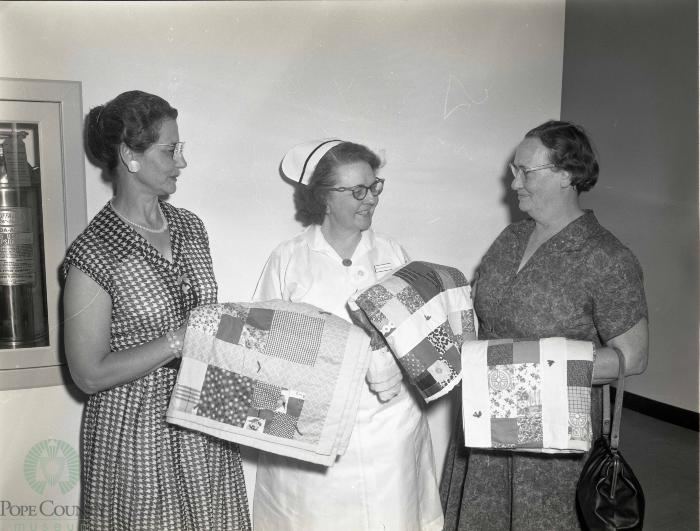 Women's Society Of Christian Service, Glenwood, Minnesota, presents blankets