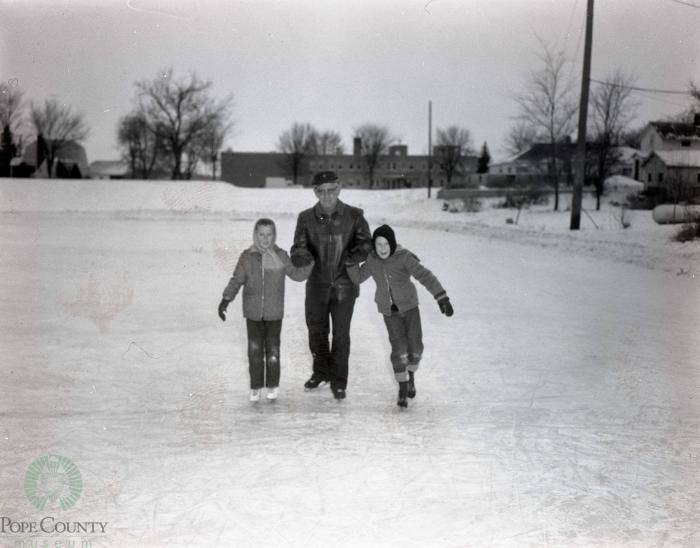 Skaters At City Skate Rink, Glenwood, Minnesota 
