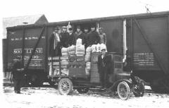 The beginning of a good job.  Unloading 40,000# of choice Idaho Alfalfa seed at Henning, 1924.  This
