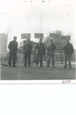 men carrying signs in front of Land O'Lakes, 1971