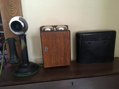 Candlestick telephone with ringer box and battery case