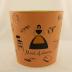 Wastebasket, pink cardboard with illustrations of household items printed on it, Maid of Honor