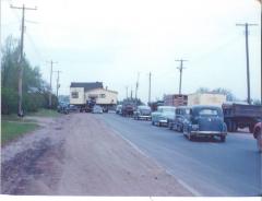 Photo of Gulden's 19th Hole restaurant being moved along highway 61