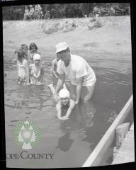 Red Cross water safety instructor Vernon Maetzold at Glenwood, Minnesota swimming beach