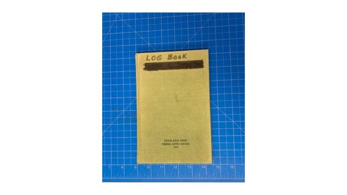 Green log book from Morris Post Office