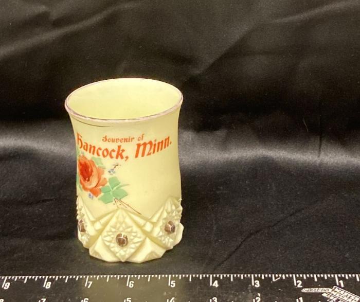 Beverage tumbler crack to the left of Minnesota top to bottom