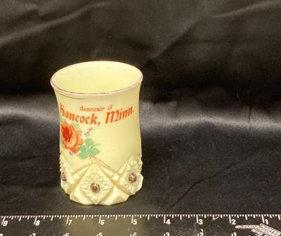 Beverage tumbler crack to the left of Minnesota top to bottom