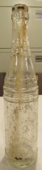 Clear Round with Several Round Bands Glass Bottle