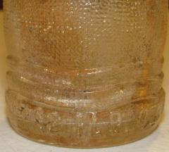 Clear Round with Curvy Bands Glass Bottle