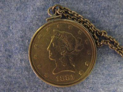 1881 gold coin on a chain
