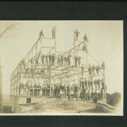 Photo of a barn raising in 1910 in Mantorville, MN