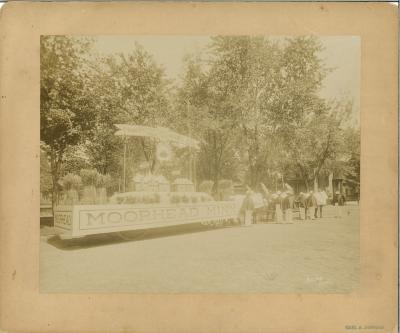 Moorhead parade float, ca. 1880s, "Minnesota's First Citizen" "Key City" "Moorhead, Minn."