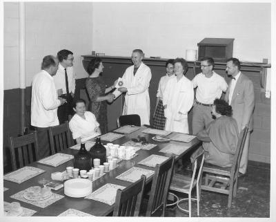 Carloyn Larsen receiving an award, 1960