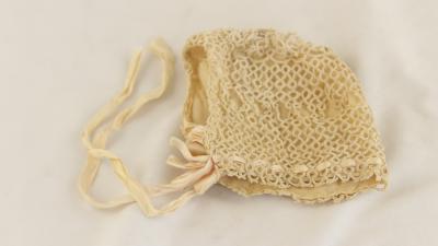 Ivory crocheted baby bonnet