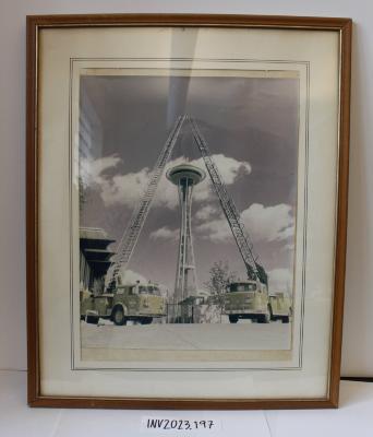 Framed Photograph of Two Firetrucks with the Seattle Space Needle 