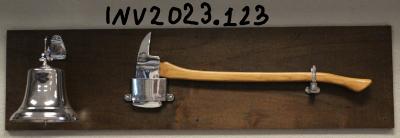 Plaque with Chrome-Plated Bell and Ax