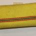 Section of Highlighter Yellow Fire Hose With Red and Black Stripes 