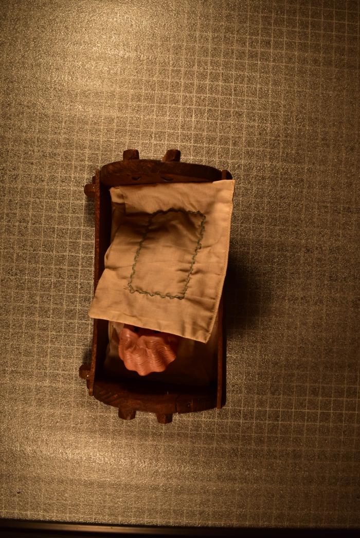 Cradle, Doll