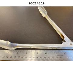 Aluminum tongs used by Dorothy Wagner