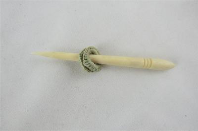Tatted circle pieces in green thread