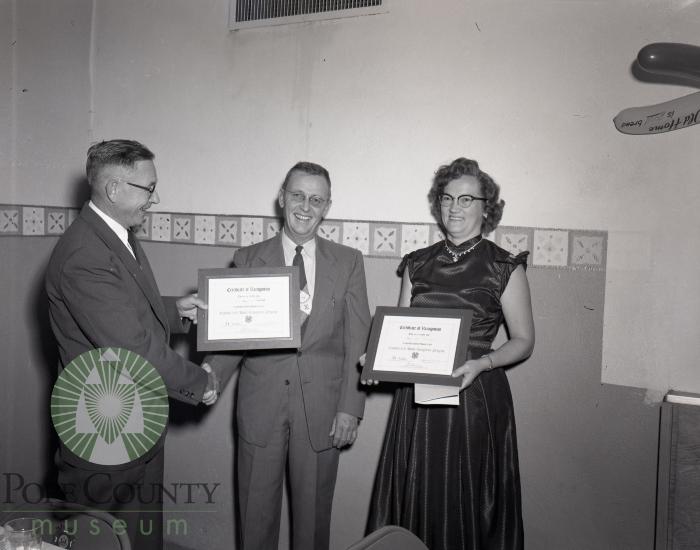 N. P. Hanson presents alumni award