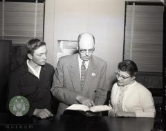 Burl Massman and Jane Vogland of Villard is with Judge Gilman P. Gandrud