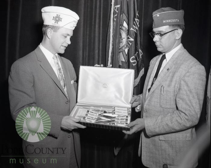 Cooper Holt, National VFW chief receives a gift. Glenwood, Minnesota 