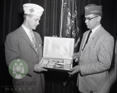 Cooper Holt, National VFW chief receives a gift. Glenwood, Minnesota 