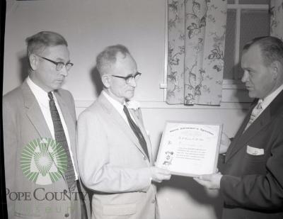 Chester Bennett recieves Skelly Award. Lowry, Minnesota