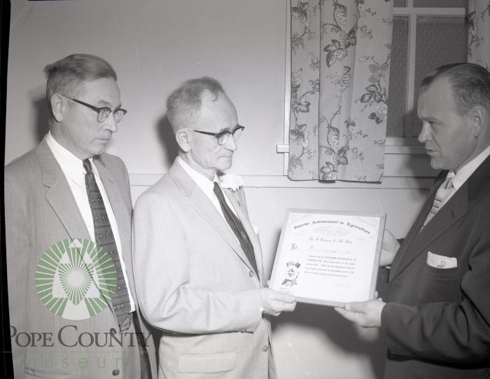 Chester Bennett recieves Skelly Award. Lowry, Minnesota