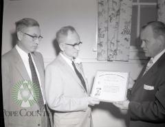 Chester Bennett recieves Skelly Award. Lowry, Minnesota