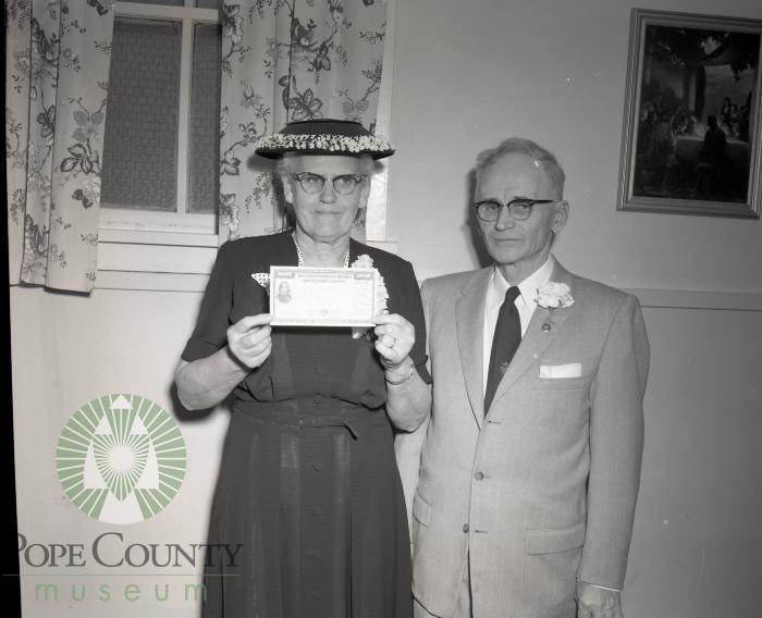 Bertha and Chester Bennett and there $100 Savings Bond. Lowry, Minnesota