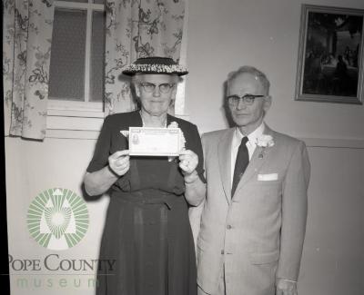 Bertha and Chester Bennett and there $100 Savings Bond. Lowry, Minnesota