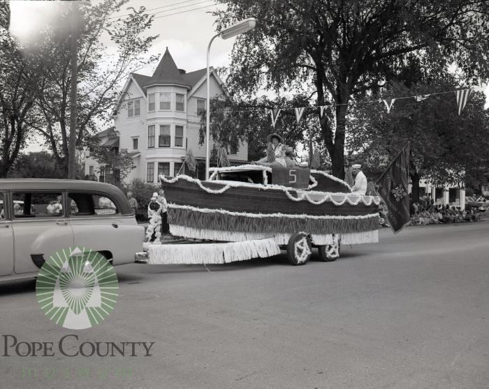 1957 Glenwood Waterama Grand Day Parade, Sandra Stone candidate float. Glenwood, Minnesota