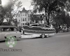 1957 Glenwood Waterama Grand Day Parade, Sandra Stone candidate float. Glenwood, Minnesota
