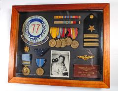 framed collection of  personal Military objects