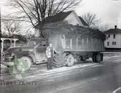 Gus Anderson delivers Christmas trees. Glenwood, Minnesota